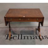 A Regency mahogany sofa table with a pair of frieze drawers,