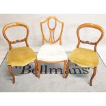 A set of three 19th century satinwood shieldback dining chairs 44cm wide x 94cm high and a pair of