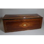 An early 20th century Swiss inlaid rosewood music box case lacking movement, 78cm wide x 27cm high.