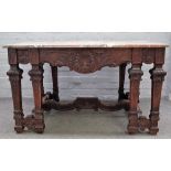 A Baroque revival rectangular marble top centre table, on eight carved square tapering supports,