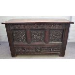 A late 17th century and later oak mule chest, of panelled construction, with hinged top,