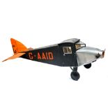 A scratch built model of an ABC Robin monoplane, finished in black and orange, 175cm long,