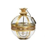 A Modern lacquered brass globe lantern with an internal four light pendant, fitted for electricity,