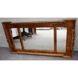 A George II style parcel gilt walnut triple plate rectangular overmantel mirror,