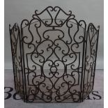 A modern wrought copper folding fire screen, 61cm wide.