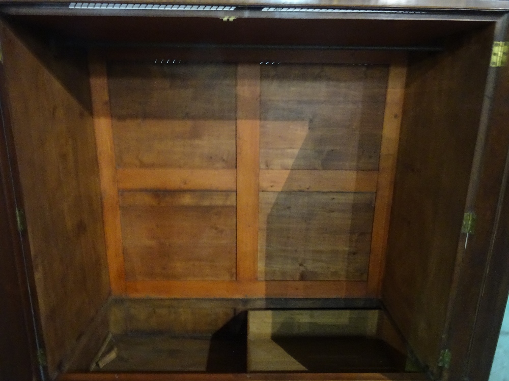 A George III mahogany linen press with moulded cupboard doors over two short and one long drawer, - Image 2 of 9