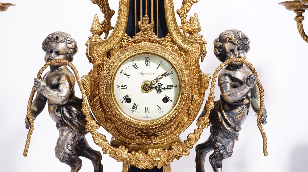 An Louis XVI style gilt metal mounted clock garniture, 20th century, - Image 2 of 3