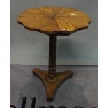 An early 19th century mahogany scallop shaped top occasional table on spiral twisted column on the