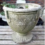An early 20th century reconstituted stone planter with a foliate motif, 46cm wide x 50cm high.