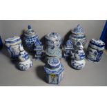 Modern Asian ceramics, including; a pair of vases and covers in the form of pagodas,