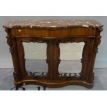 A Victorian rosewood serpentine chiffonier with marble top over mirrored doors,