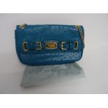 A Michael Kors 'Hamilton' blue ostrich leather handbag with gold-tone hardware.
