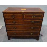 An Edwardian inlaid mahogany and satinwood banded chest of two short and three long graduated