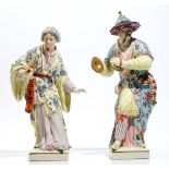 A pair of Continental porcelain figures of Malabar musicians, 20th century,