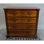 A Victorian mahogany chest of four long graduated drawers on bun feet, 110cm wide x 108cm high.