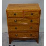 A 19th century style small mahogany chest of two short and three long graduated drawers,