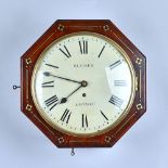 An octagonal mahogany and brass line inlaid mahogany Dial timepiece Mid 19th Century The 10in