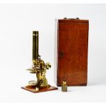 A mid-19th century lacquered brass microscope, engraved to the foot 'James How, 2 Foster Lane,