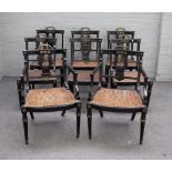 A set of eight Regency gilt metal mounted ebonised cane seat dining chairs on tapering turned