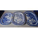 A group of three 19th century blue and white meat plates, the largest 50cm wide.