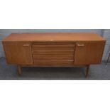 G PLAN; a mid-20th century teak dining room suite, to comprise, dining table,