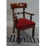 A William IV mahogany framed open armchair on reeded tapering supports, 55cm wide x 98cm high.