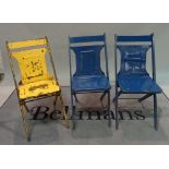 A set of three modern painted metal folding chairs, 39cm wide x 77cm high, (3).