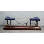 An early 20th century mahogany and blue leather upholstered club fender, 160cm wide x 48cm high.