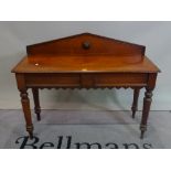 A Victorian mahogany single drawer serving table on turned supports, 119cm wide x 95cm high.