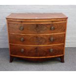 A Regency satinwood banded mahogany bowfront chest with brushing slide over three long graduated