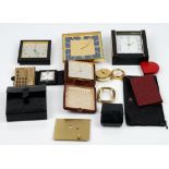 A group of seven Swiss travel alarm and desk clocks, by Ebel, Luxor, Looping, Swiza,