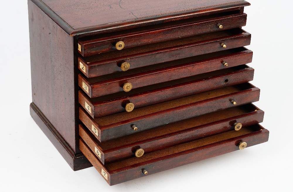 A 19th century mahogany table top collector's chest of seven long graduated drawers on a plinth - Image 3 of 4