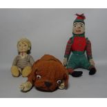 A group of three early 20th century stuffed toys, one formed as a dog, 35cm wide, (3).