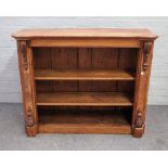 A Victorian oak floor standing open bookcase, on plinth base, 115cm wide x 92cm high.