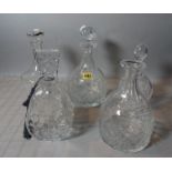 A group of five modern cut glass decanters, the tallest 30cm high.