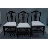 A set of six George III mahogany dining chairs on tapering square supports, 52cm wide x 97cm high,