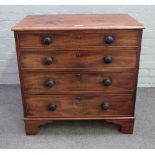 A George III small mahogany chest with four long graduated drawers on bracket feet,