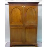 An Edwardian inlaid mahogany twin door wardrobe on bracket feet, 132cm wide x 195cm high.