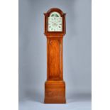 A mahogany Longcase clock Early 19th century The arched hood with two columns above the trunk door,