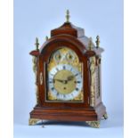 A late Victorian giltmetal-mounted mahogany quarter chiming bracket clock In the George III