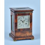 A William IV rosewood mantel timepiece The top with inset flush carrying handle,