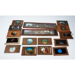 A collection of approximately fifty coloured magic lantern slides,