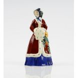An Austrian earthenware figure of a girl representing Winter, after a model by Johanna Meir-Michel,