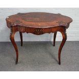 A Louis XV style kingwood, rosewood, ebonised inlaid and gilt metal mounted writing table,