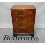 A George III style mahogany chest of four long graduated drawers on bracket feet,