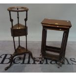 An Edwardian nest of three tulip banded mahogany occasional tables on turned supports,