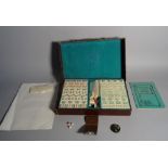 Asian interest, a modern Mahjong set within a leather carrying case, 33cm wide x 5cm high.