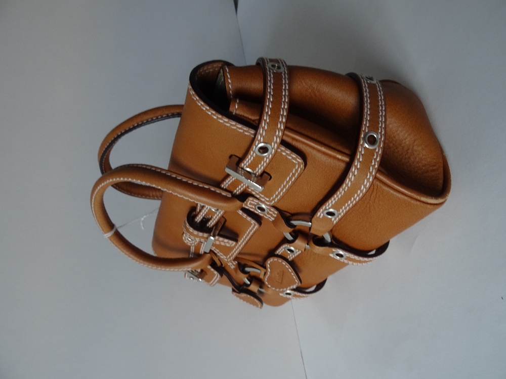 A Luella 'Giselle' tan leather handbag, with twin leather loop handles and strap decoration, - Image 6 of 10