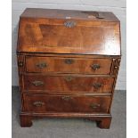 A walnut cross and feather banded bureau, reconstructed, elements 18th century,