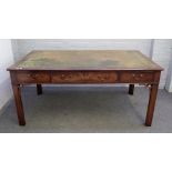 A large George III style mahogany library table,